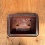 Two drainage holes, four wire holes.