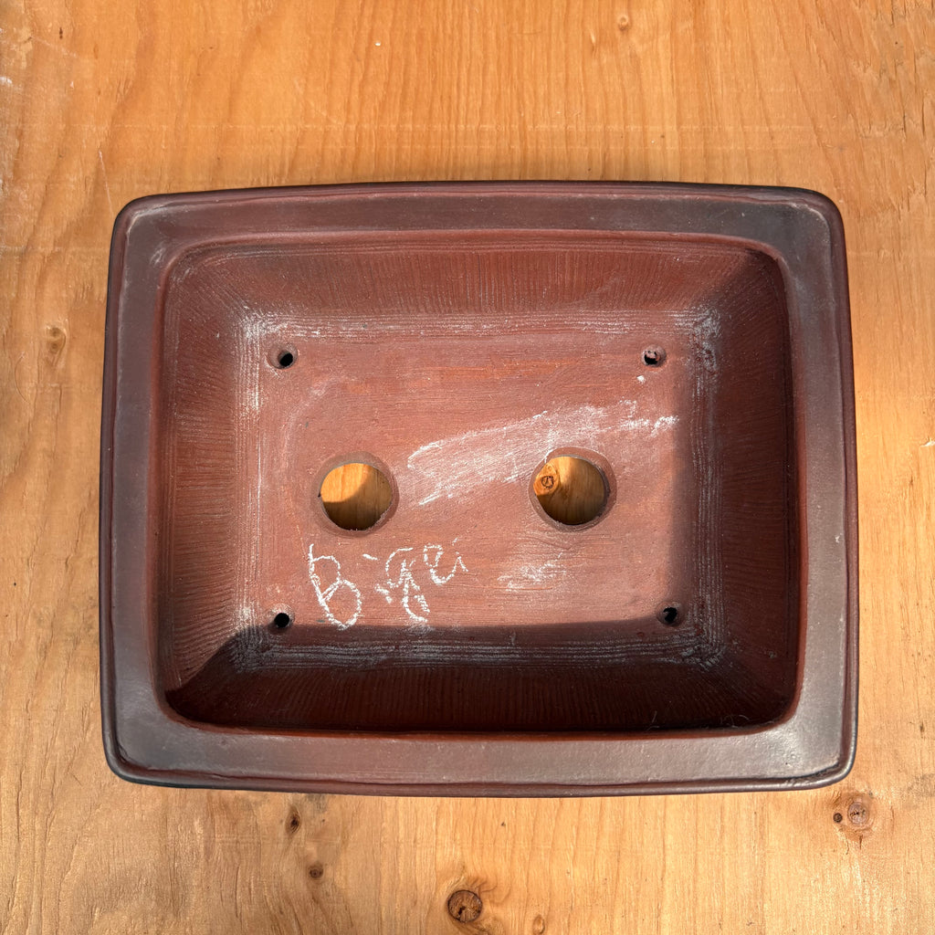 Two drainage holes, four wire holes.