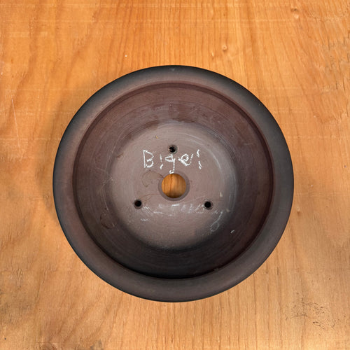 drainage hole and three wire holes.  round tokoname bonsai pot
