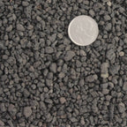 Close up particle size of the porous surface of black lava, for bonsai soil structure, drainage and aeration.