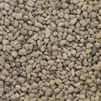 Close-up of Hyuga pumice bonsai soil aggregate showing its porous volcanic texture and light tan/beige color.