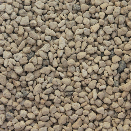 Close-up of Hyuga pumice bonsai soil aggregate showing its porous volcanic texture and light tan/beige color.