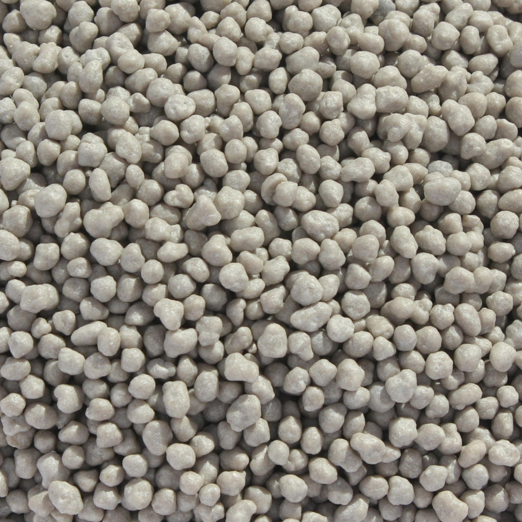 Nutricote 14-13-13 T100 slow release bonsai fertilizer grey colour and small granule size.