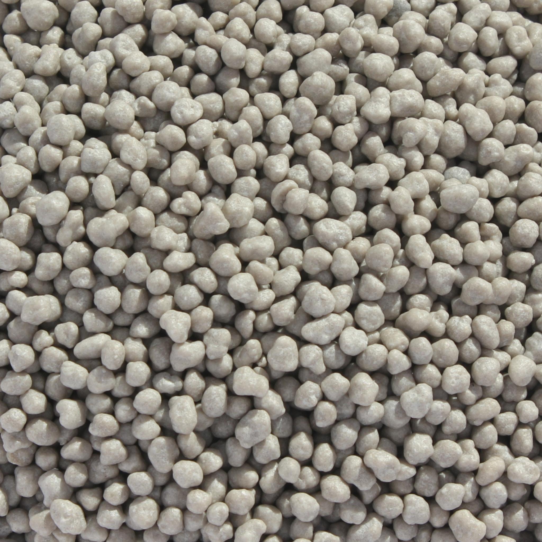Nutricote 14-13-13 T100 slow release bonsai fertilizer grey colour and small granule size.